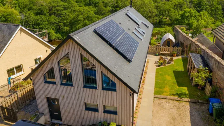 Modern house with solar panels on roof
