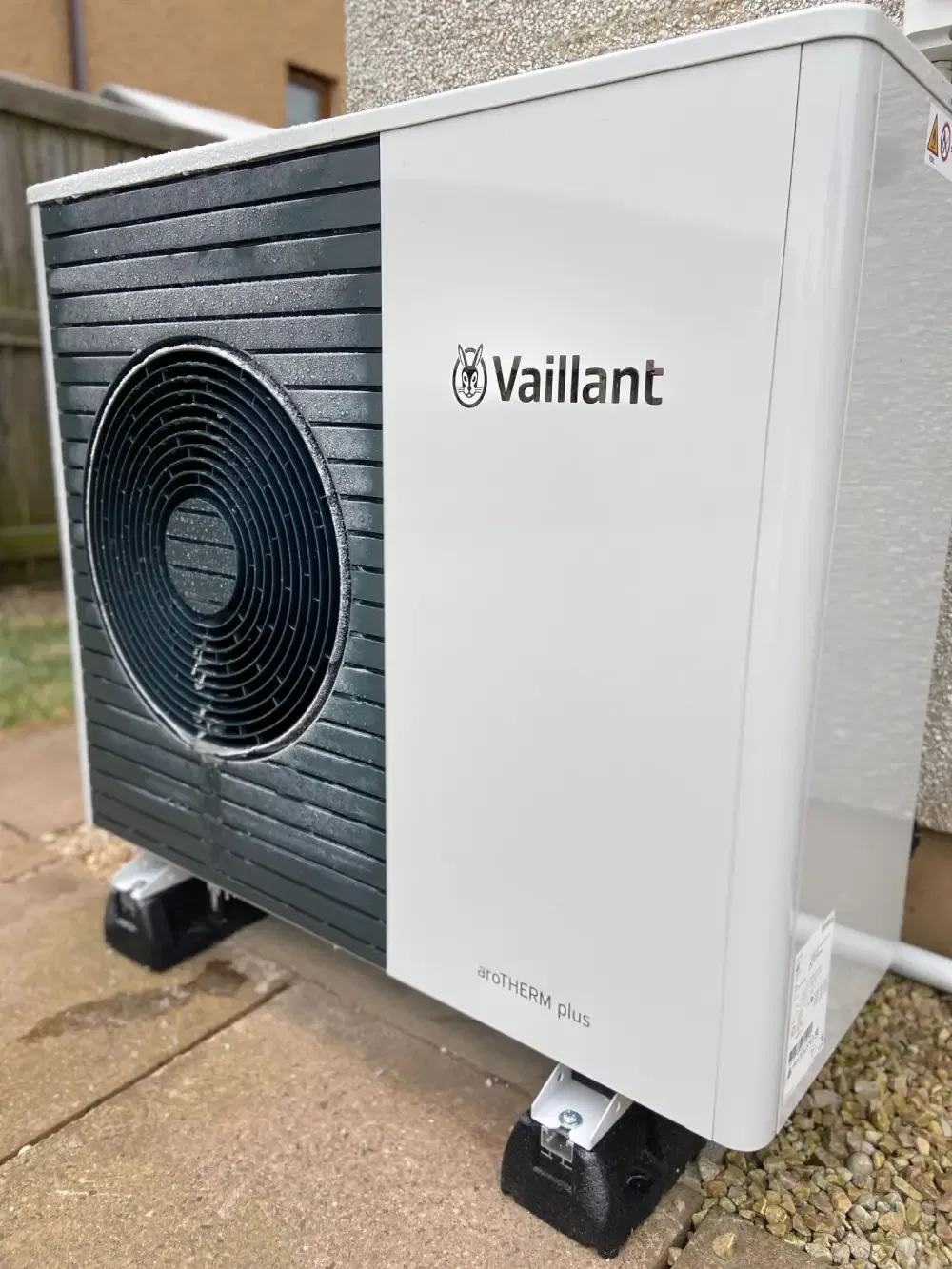 Vaillant aroTHERM plus heat pump unit outdoors.